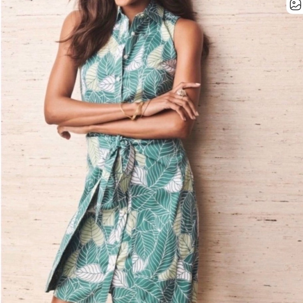 Untuckit tropical sleeveless shirt dress with wrap detail.